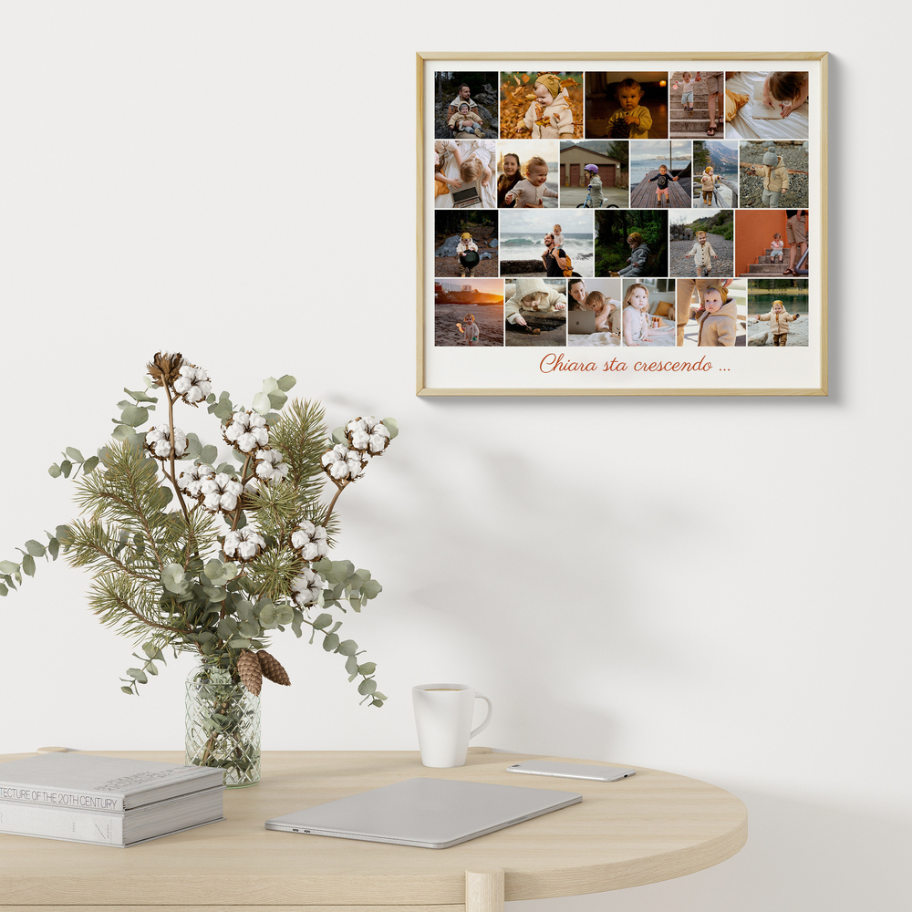 Collage di foto di una bambina in file con dedica, in cornice di legno chiaro sopra un tavolo con fiori.