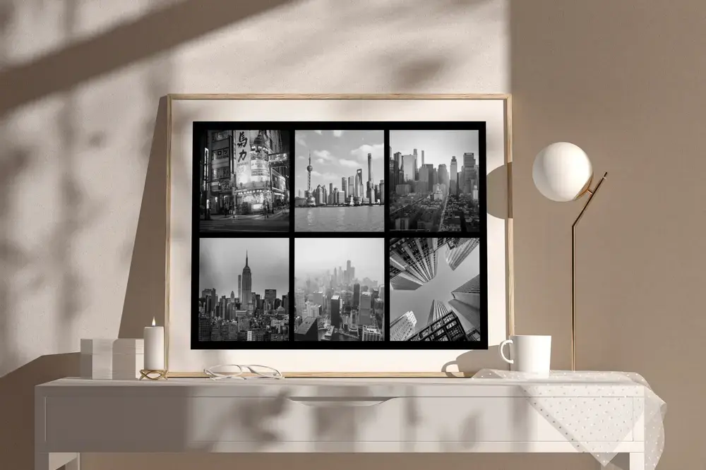 Collage de villes en noir et blanc, cadre bois sur un buffet clair, une idée cadeau en souvenir d’un voyage