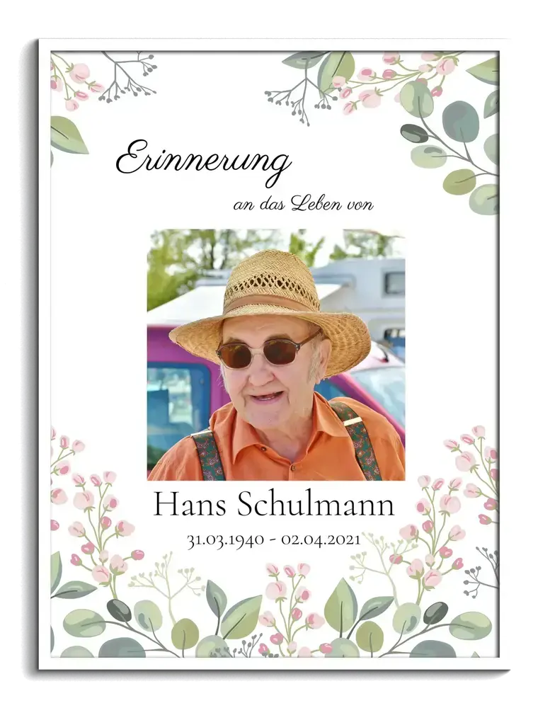 Trauerposter mit Porträt, Namen und Lebensdaten auf zartem Blumenhintergrund im weissen Rahmen